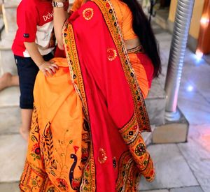 Vibrant Red & Orange Embroidered Saree