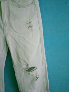 Distressed Light Wash Denim Jeans