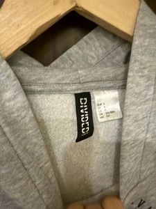 Gray Hoodie with Striped Sleeves