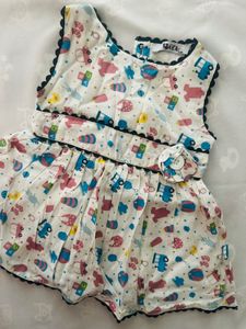infant's white sleeveless cotton muslin frock