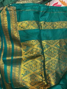 Elegant Teal Saree with Gold Border