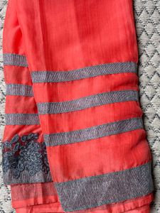 Vibrant Coral Saree with Embellished Border