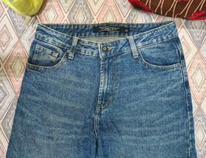 Blue Denim Jeans with Ripped Detail