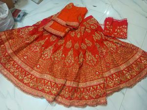Stunning Orange & Red Embroidered Lehenga Choli