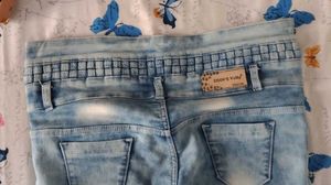 Light Wash Distressed Jeans with Unique Waistband