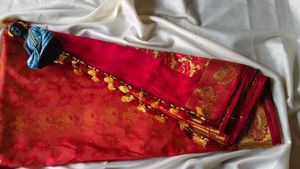 Vibrant Red Silk Saree with Gold Border
