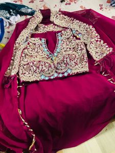Maroon Lengha With Elaborate Detail