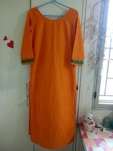 Vibrant Orange Kurta with Green Embroidery