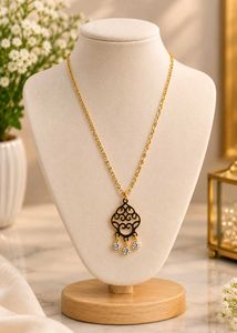 Elegant Gold Necklace with Black Pendant