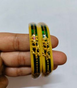Elegant Bangles with Green Accent