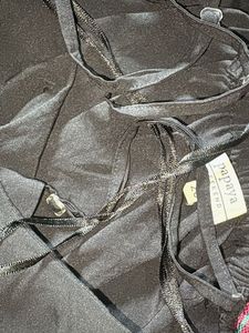 a black casual women’s top from Papaya weekend