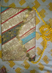 Embroidered sling Bag