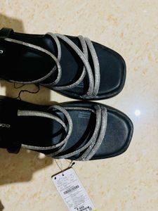 Stylish black sparkle wedges