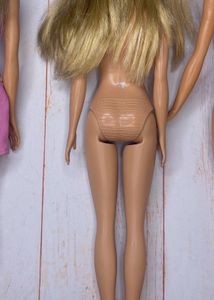 Reserved Barbie Doll in Orange Dress