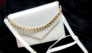 White Slingbag With Golden Chain And Superb Look