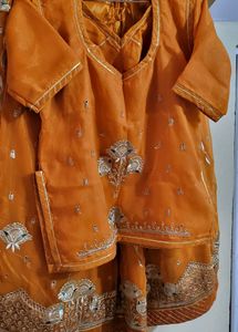 stitched rajputi poshak in orange colour
