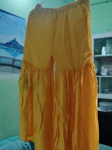 Bright Yellow Sharara Kurta with bottom for girls.