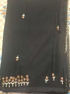 Elegant Black Embroidered georgette Saree attached