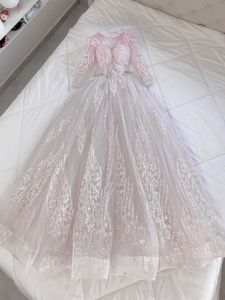 pink white toned corset lace up ballgown