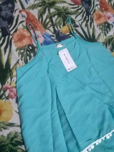 Chic Teal Top with Pom Po