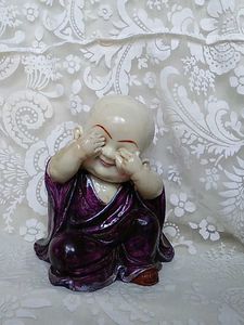 Adorable Monk Figurine - Playful Pose