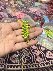 Green &amp; Yellow Beaded marble coloured Bracelet