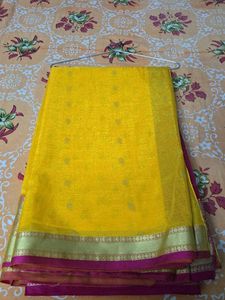 Vibrant Yellow Saree with Golden Border