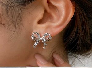 Chic Silver Bow Earrings