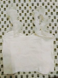 Chic Ruffle Trim Sleeveless Top-White