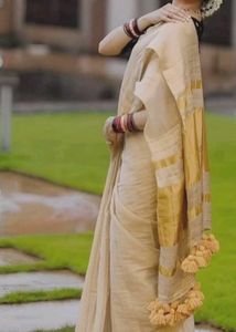 Elegant Linen Golden Saree with Tassels