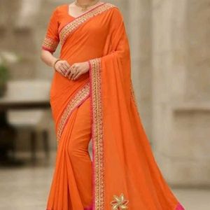 Elegant Orange Embroidered Saree with blouse