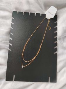 Set of 4 Gold Tone Necklaces