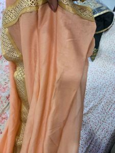 Elegant Peach Saree with Golden Border