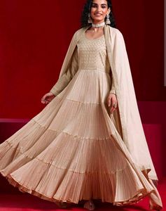 Elegant Tiered Gown with Cape