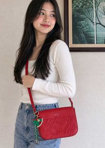 Chic Red Crossbody Bag with Charm