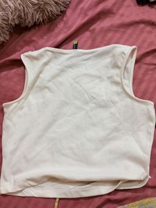 Cream Cut-Out Sleeveless Top