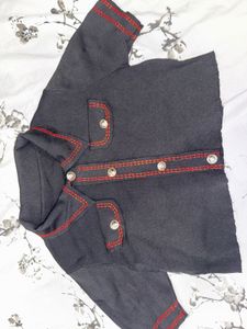 Chic Black top with Red Stitching