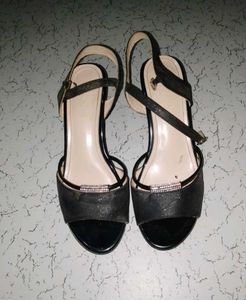 Elegant Black Heels with Ankle Strap