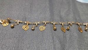 Gold bracelet with Heart and Leaf Charms