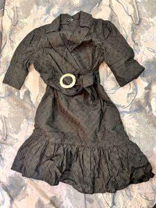 Elegant Black Midi Dress with Statement Buckle