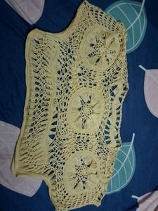 It is a yellow shrug.