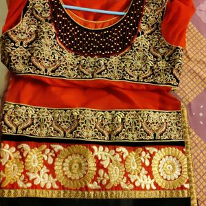 Elegant Orange &amp; Black Embroidered Salwar Kameez
