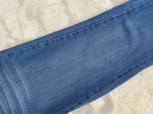 Minimalistic faded pale blue bootcut