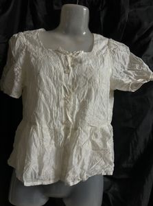 Embroidered White Peplum Blouse