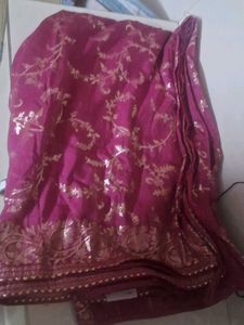 Elegant Pink Saree with Gold Motifs