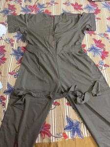 Ives Women Brown Solid Basic Jumpsuit