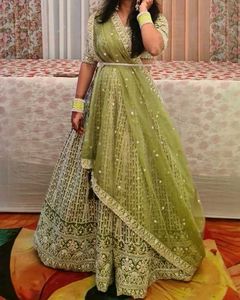 Green Mirror Work Organza Lehenga Choli