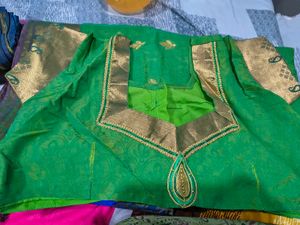 Vibrant Green Saree with Gold Motifs