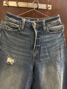 Distressed Blue Denim Jeans