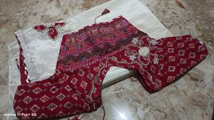 Elegant white Saree with Red Border
